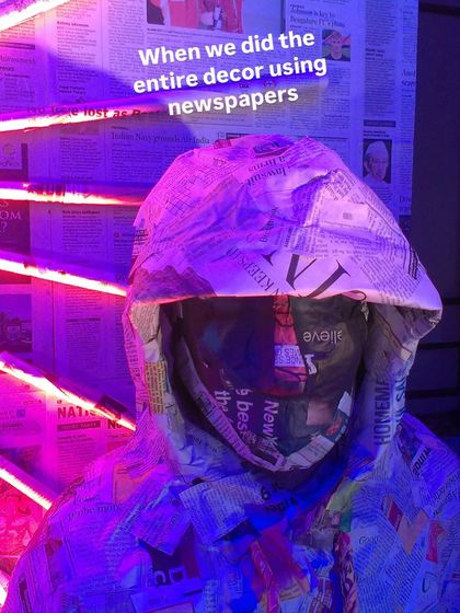 A close-up of one of the hooded figures we created from newspaper. The texture and form were built up layer by layer, creating a surprisingly detailed and expressive sculpture from simple materials.