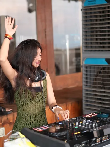 Hand in the air, feeling the groove. A shot of me fully engaged with the music and the beautiful beachside atmosphere.