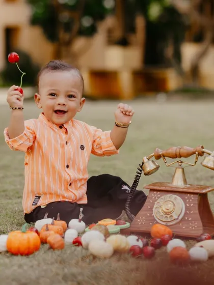 A playful shot with a vintage telephone prop. Using unique props helps bring out a child's curiosity and create fun, interactive photos.