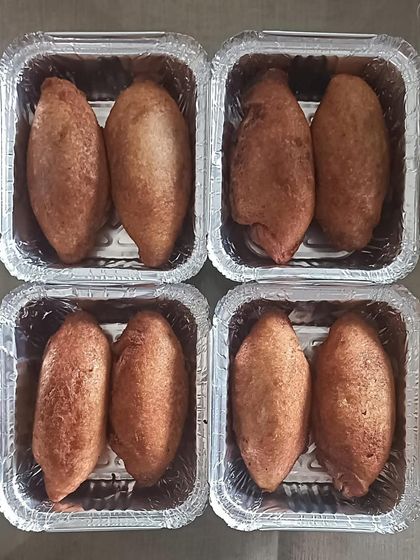 Freshly made bread rolls, perfect for breakfast or as a tea-time snack. They are crispy on the outside and soft on the inside.