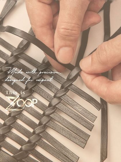 Made with precision, designed for impact. This image captures the intricate hand-weaving process, showcasing the impeccable quality and expert tailoring that goes into our sustainable collections.