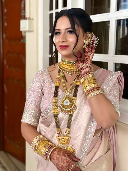 A close-up of the bride, her makeup looking flawless even at the end of a long day.