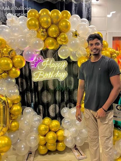 A proud moment with another successful birthday decoration.