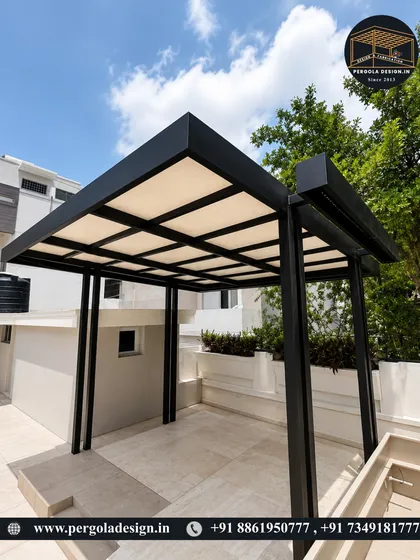 This freestanding pergola demonstrates a bold, modern aesthetic with its strong lines and contrasting black frame against the white building. It defines an outdoor room on the terrace, ready for furniture and personalization.