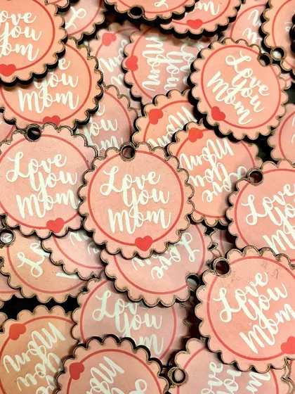 Little wooden scallops of love that went out with many Mother's Day gifts. A small detail to say 'Love You Mom'.