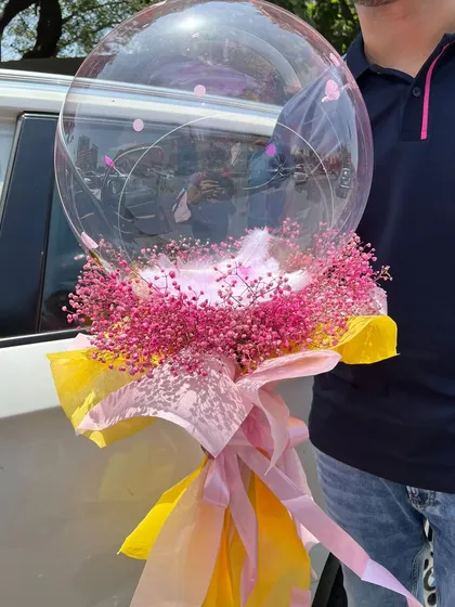 Sometimes, a beautiful balloon bouquet is all you need to say "I love you." This one, with delicate pink gypsophila, is a perfect Valentine's Day surprise.