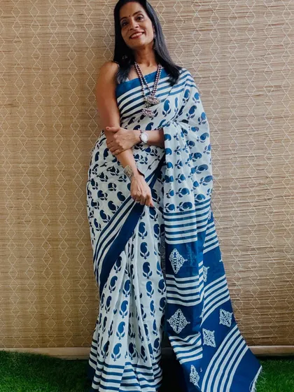 An indigo and white block printed cotton Mulmul saree. This is a timeless and elegant design that is always in style.