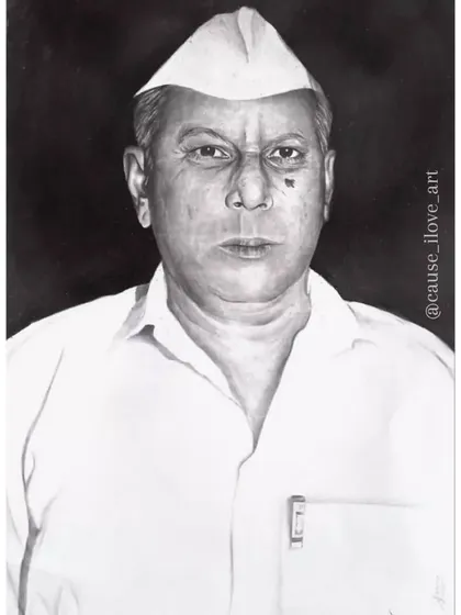 A formal A3 pencil sketch of a man wearing a traditional Gandhi cap, created as a memorial portrait. The dark background helps the subject stand out.