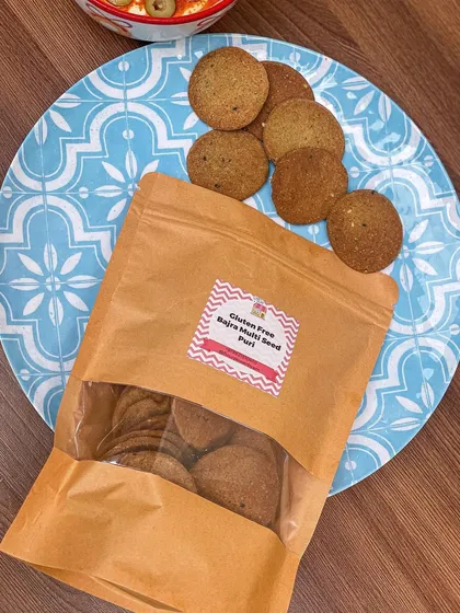 This is my Bajra Multi-seed Puri, a baked, gluten-free, and vegan snack that's perfect for guilt-free munching.