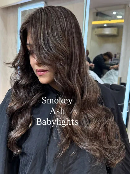 This is not just highlights, it's a masterpiece of smokey ash babylights. This technique creates a very fine, natural looking blend of cool tones throughout the hair.