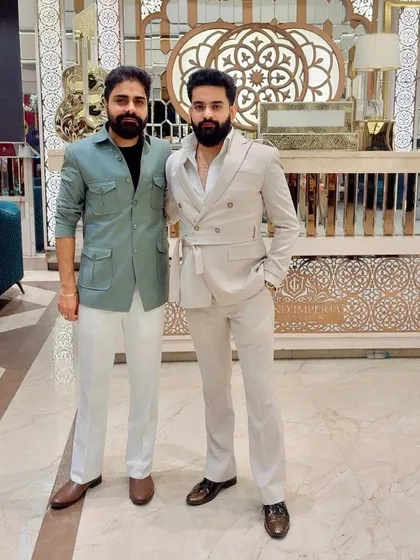 Here’s a look at two distinct styles for a modern celebration. On the left, a custom-tailored safari-style jacket, and on the right, a contemporary belted Jodhpuri suit, both designed for a sharp, confident look.