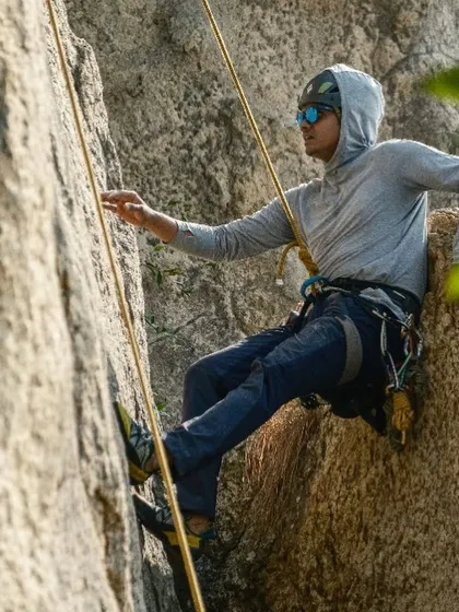 Meet Kartik, a software developer and all around outdoorsman. Here he is rappelling, showcasing the technical skills that are a core part of safe climbing.