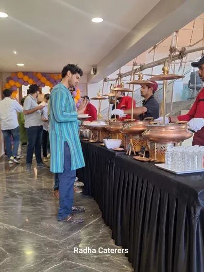 Here is my team in action at a corporate launch. We ensure the buffet line moves smoothly and every guest is attended to. Our uniformed staff are trained to be professional and helpful, so you can focus on your event without worrying about the food service.
