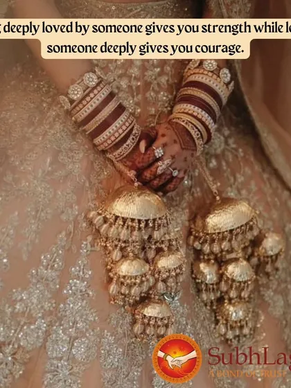 A close-up of a bride's hands, showcasing her beautiful red bangles and golden kalire. These traditional ornaments are an essential part of a bride's stunning attire.