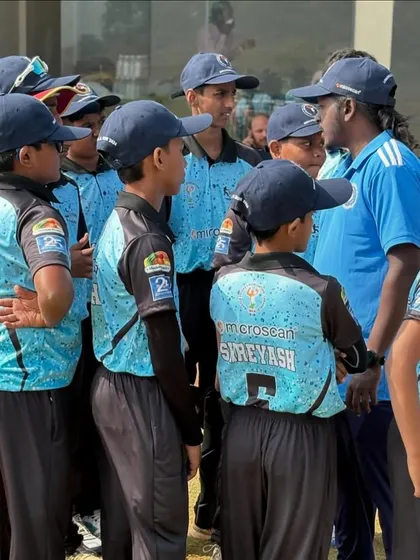 A close-up of me talking to the U-14 team. Giving them the confidence and strategy to perform their best.
