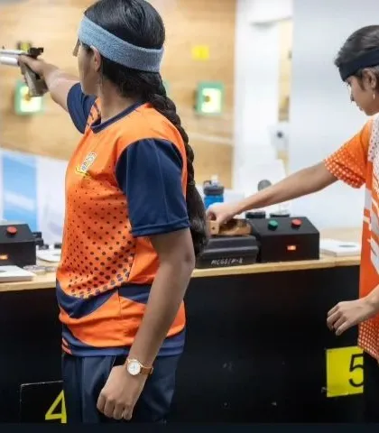 Teamwork and individual focus go hand in hand. Two of our female pistol shooters practice side-by-side, pushing each other to improve with every shot.