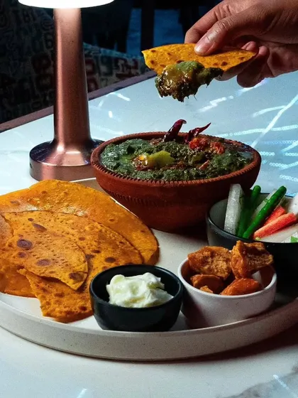 A wholesome and traditional Punjabi meal of Sarson ka Saag and Makki ki Roti, served with white butter and jaggery. A winter favourite that I bring to events.