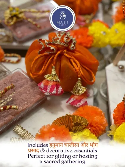 Each of my Hanuman Chalisa hampers includes bhog prasad and other decorative essentials, like this beautiful orange potli, perfect for gifting or hosting a sacred gathering.