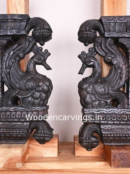 A pair of the 26-inch dark brown Hamsa brackets, shown together to emphasize their symmetrical beauty.