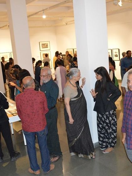 A wide view of the gallery during the preview of 'Hand Prints'.