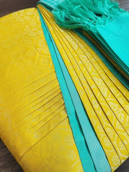 The full view of the box-folded saree, showing how compact and neat the final product is.