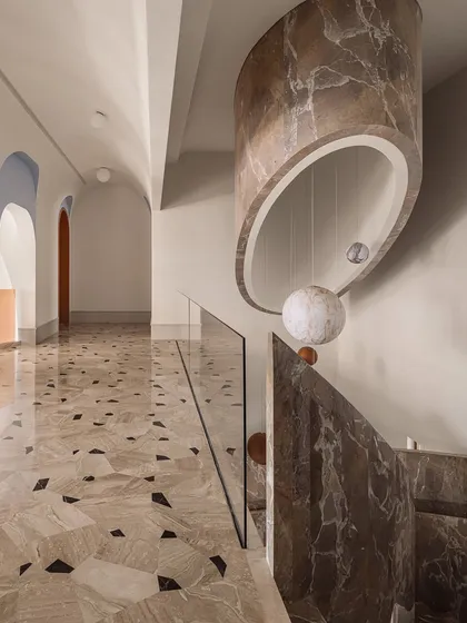 Snippets from the galleries and stairwell at Rehethaan, showing the interplay of the celestial globe installation, the marble-clad staircase, and the unique triangular Juliet balcony.