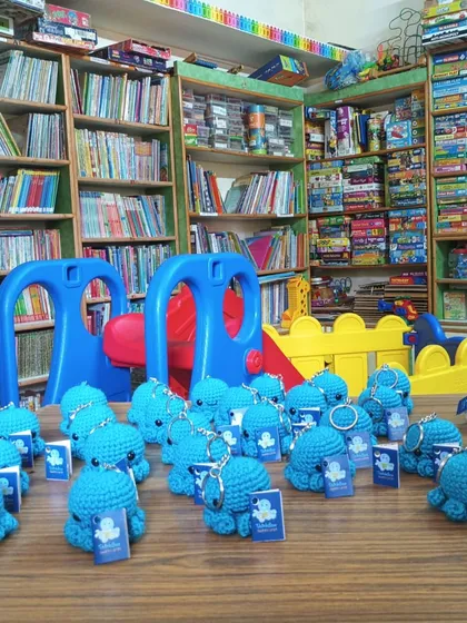 Our library is a place of wonder, with cozy reading corners, fun play areas, and shelves brimming with adventures. We also love to celebrate our readers' achievements with fun rewards, like these cute, handmade mascots for completing our reading challenge!