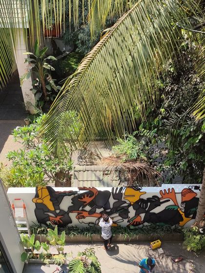 An aerial view of the installation process for the outdoor metal art.