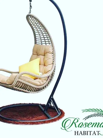 This is my single-seater egg swing, a perfect little cocoon for some alone time. It comes with a sturdy stand and plush cushions, making it an instant relaxation spot.