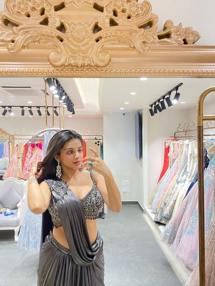 Another angle of this stunning grey pre-draped saree, showing off the beautiful embellished blouse.