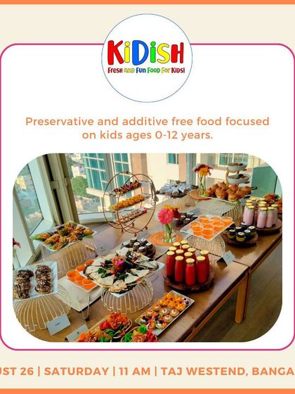 A beautiful spread from KiDish, showcasing their preservative and additive-free food for kids. From mini sandwiches to fresh juices, it's all about healthy and happy eating.