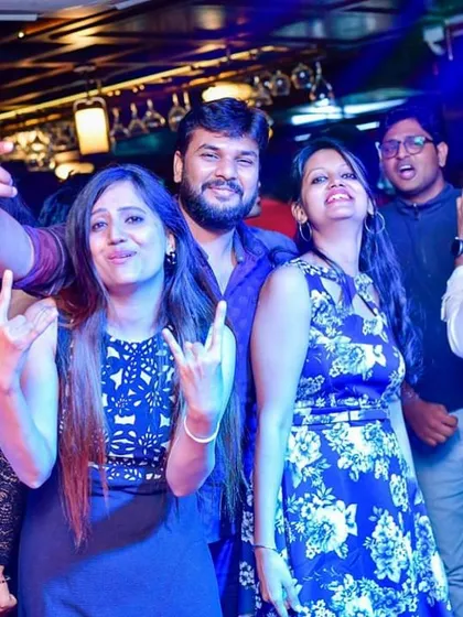 The energy on the dance floor is everything. Here, guests are seen dancing and enjoying the music under the club lights during my set.