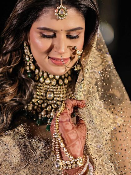 A serene bridal portrait with soft, flowing hair.