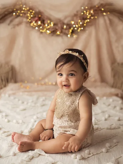 This little doll was an absolute dream to photograph. Her sweet, gentle smile perfectly complements the warm and rustic boho theme.