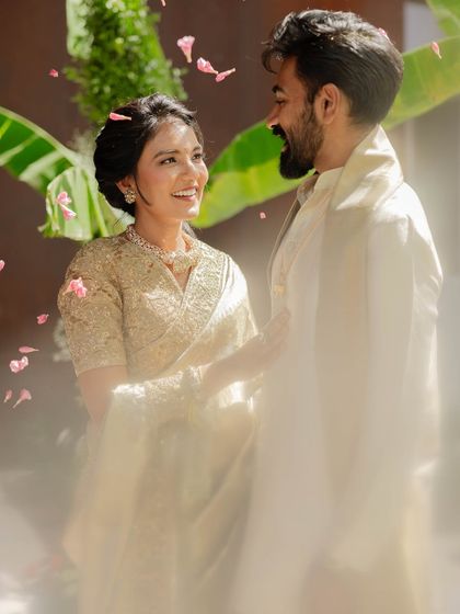 A candid, joyful moment captured beautifully. The soft, elegant makeup ensures the client looks flawless and feels confident even in unposed, happy moments.