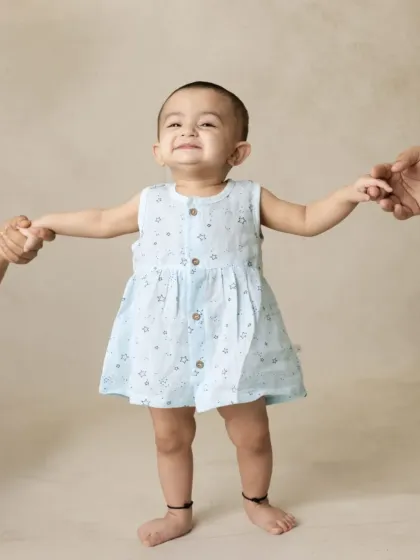 A collection of simple, classic portraits of twin babies. Without props or themes, their individual expressions and connection are beautifully highlighted.