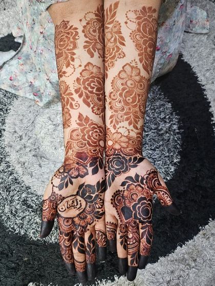 The final stain for "Zeeshan ki dulhan." The bold floral patterns have developed into a beautiful, dark color, perfect for her big day.