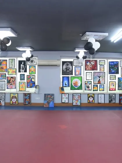 A wide view of our annual Fine Arts Exhibition at the Dhwani Kala Mahotsav. We transform our space into a professional gallery to showcase the amazing work of our students, giving them a real-world platform to display their talent.