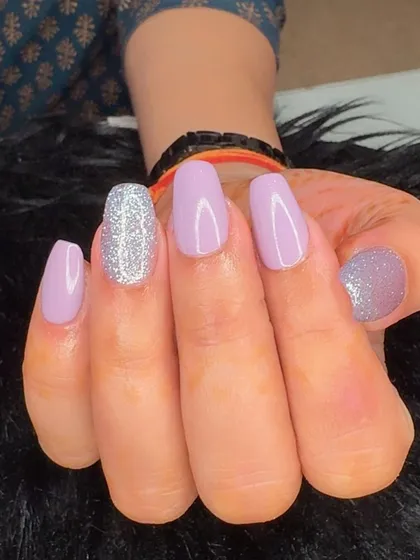 Another view of the festive lavender and silver glitter manicure.