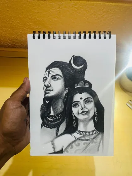 The final, completed sketch of Shiv and Parvati, held up for display. This piece is a celebration of their divine union. Har Har Mahadev.