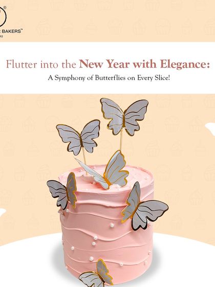 Flutter into the new year with elegance. This simple pink cake is decorated with graceful grey butterfly toppers, offering a chic and modern way to celebrate.
