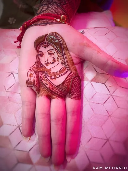 A portrait of a bride in her finery, covering the entire palm. I use fine lines and shading to capture the details of the jewelry, expression, and bridal veil.