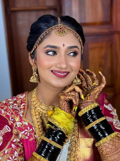 My gorgeous bride Nayana, all set for her Muhurtham. I love creating these beautiful looks, focusing on flawless skin and eyes that sparkle. Her happiness is the best reward.