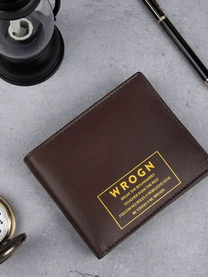 A styled shot of the 'WROGN' wallet with brand messaging.