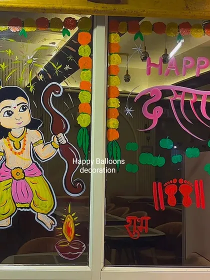 A full view of a two-panel glass door decorated for Dussehra. The design combines a character painting of Lord Rama with festive text and traditional motifs like 'Shubh Labh'.
