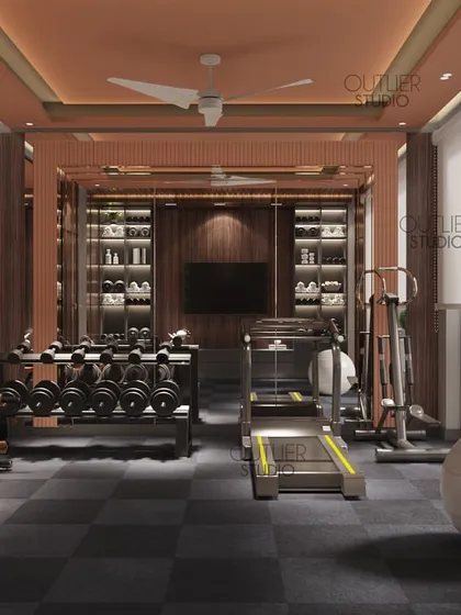 A wider view of the private home gym, showing the full range of equipment and the mirrored walls that make the space feel larger and more energetic.