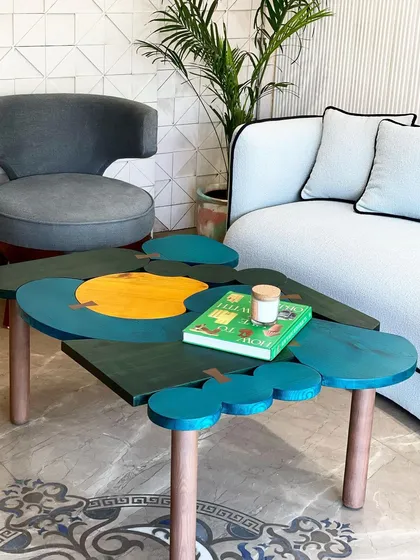 Meet the 'Doodle Coffee Table', a piece that’s all about playful design. I crafted this from solid white ashwood and used bold, vibrant colors to make it a centerpiece that sparks joy. The interlocking forms create a dynamic canvas for any modern living space.