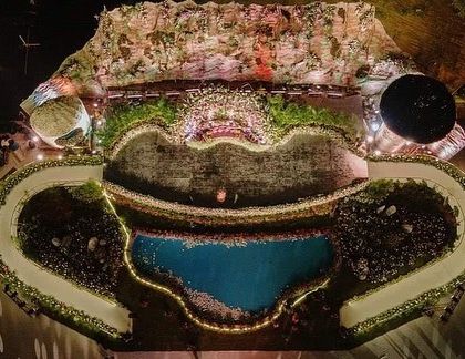 Another stunning aerial view of the reception, showing how all the elements, including the lighting and seating, come together to form a cohesive and spectacular world.