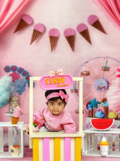 Our candy shop theme is perfect for a sweet celebration, with this little girl serving up smiles from behind the counter.