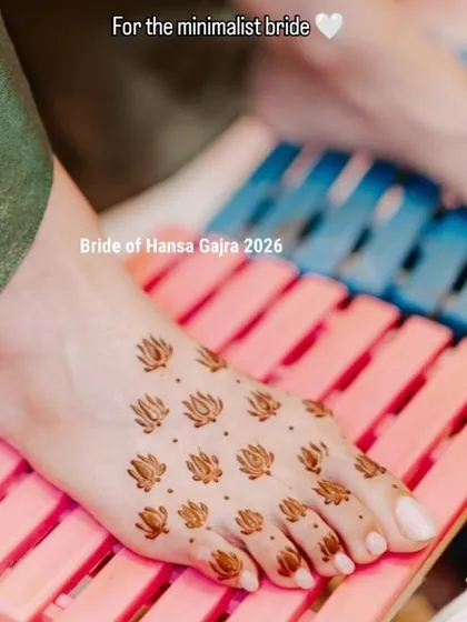 Minimal mehendi for the feet. This simple yet beautiful design features small lotus motifs scattered across the foot, creating a delicate and modern look.